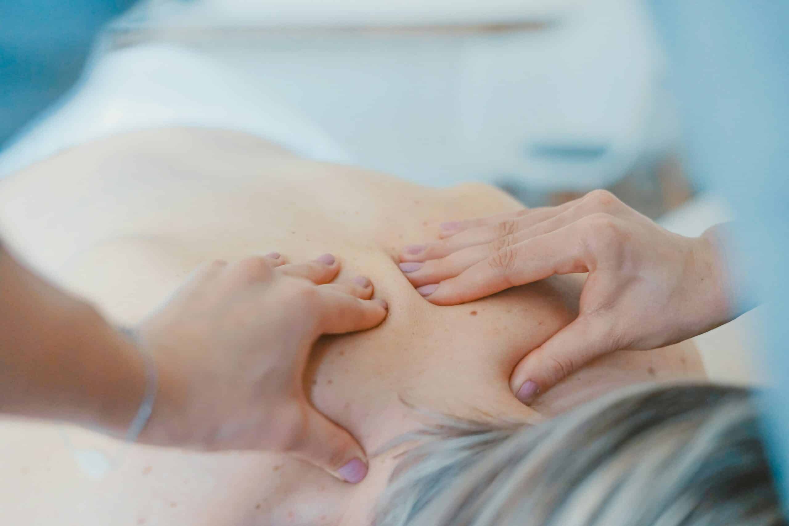 Woman receiving a massage to release toxins